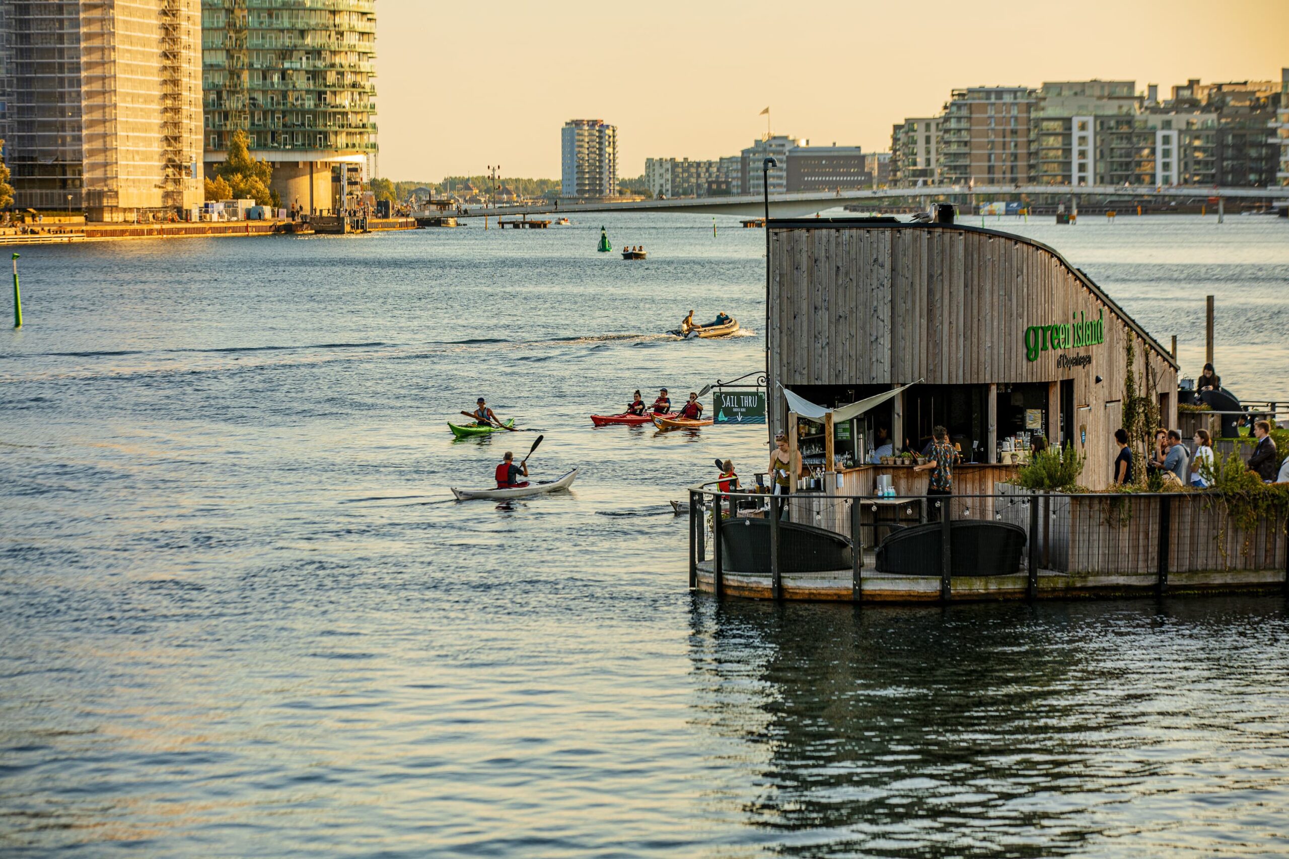 People kajaking in Copenhagen habour by the floating bar