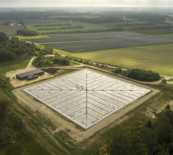 Sustainable district heating through solar heating plants and thermal storage